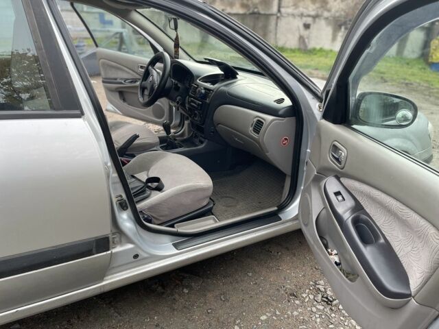 Серый Ниссан Альмера, объемом двигателя 1.8 л и пробегом 202 тыс. км за 2100 $, фото 9 на Automoto.ua