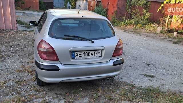 Серый Ниссан Альмера, объемом двигателя 1.5 л и пробегом 240 тыс. км за 4000 $, фото 2 на Automoto.ua