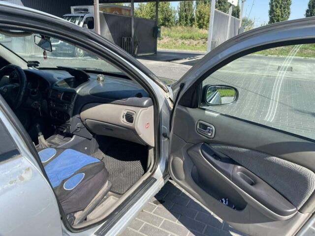 Сірий Ніссан Альмера, об'ємом двигуна 2.2 л та пробігом 371 тис. км за 1008 $, фото 6 на Automoto.ua