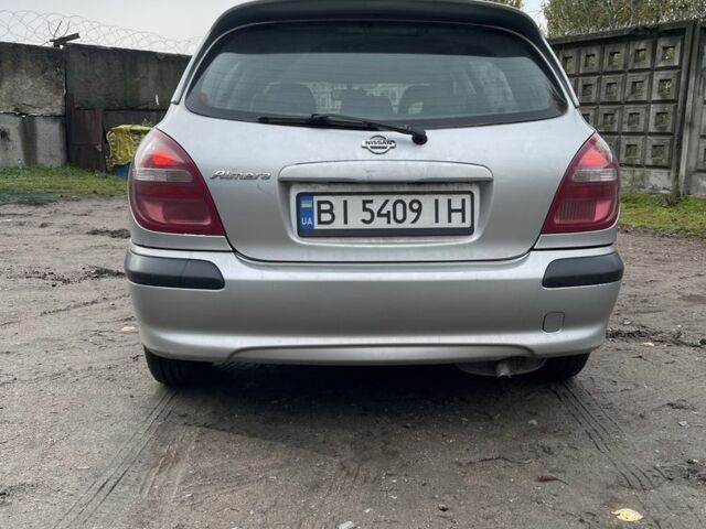 Серый Ниссан Альмера, объемом двигателя 1.8 л и пробегом 202 тыс. км за 2100 $, фото 5 на Automoto.ua