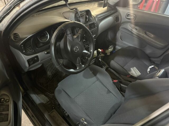 Серый Ниссан Альмера, объемом двигателя 0 л и пробегом 100 тыс. км за 500 $, фото 4 на Automoto.ua