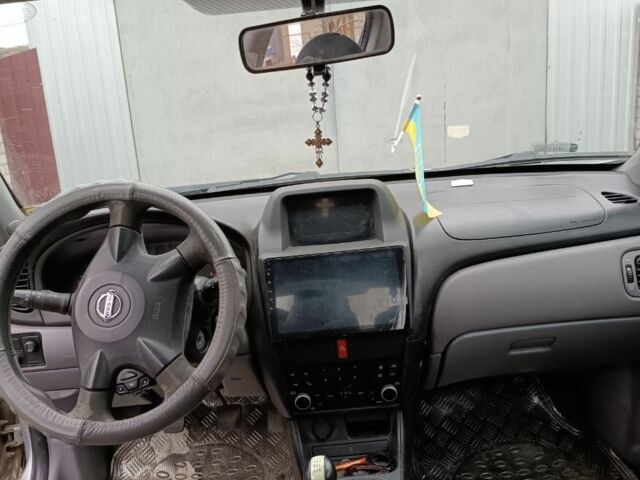 Серый Ниссан Альмера, объемом двигателя 1.5 л и пробегом 295 тыс. км за 2800 $, фото 7 на Automoto.ua