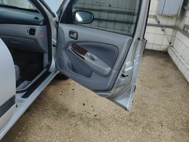 Серый Ниссан Альмера, объемом двигателя 1.5 л и пробегом 350 тыс. км за 2800 $, фото 12 на Automoto.ua