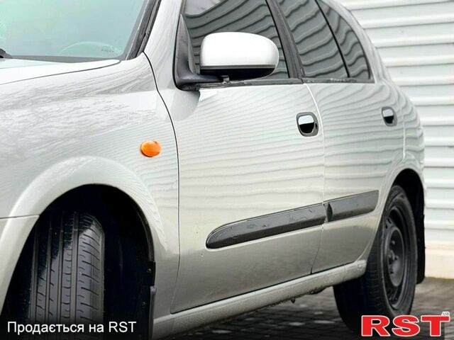 Серый Ниссан Альмера, объемом двигателя 1.5 л и пробегом 285 тыс. км за 3100 $, фото 2 на Automoto.ua