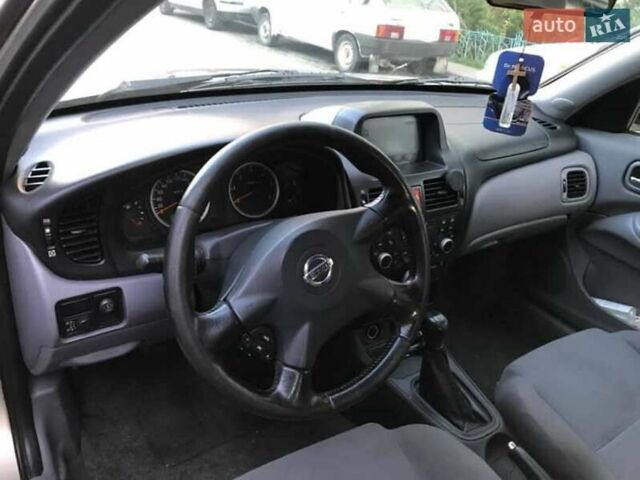 Сірий Ніссан Альмера, об'ємом двигуна 1.5 л та пробігом 292 тис. км за 3700 $, фото 4 на Automoto.ua