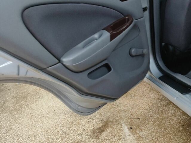 Серый Ниссан Альмера, объемом двигателя 1.5 л и пробегом 350 тыс. км за 2800 $, фото 11 на Automoto.ua