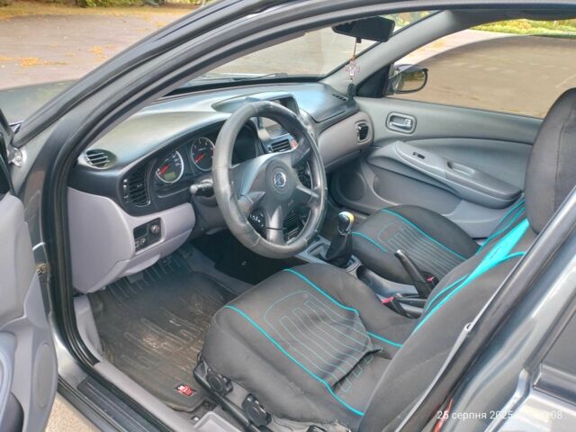 Серый Ниссан Альмера, объемом двигателя 1.5 л и пробегом 247 тыс. км за 3200 $, фото 5 на Automoto.ua