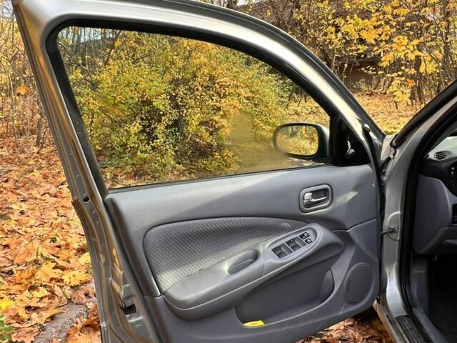 Сірий Ніссан Альмера, об'ємом двигуна 1.8 л та пробігом 300 тис. км за 2500 $, фото 11 на Automoto.ua