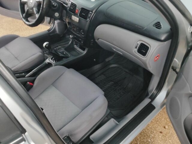 Серый Ниссан Альмера, объемом двигателя 1.5 л и пробегом 350 тыс. км за 2800 $, фото 9 на Automoto.ua