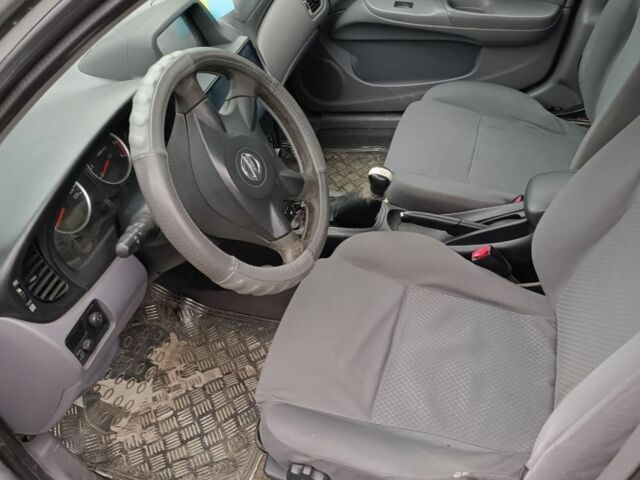 Серый Ниссан Альмера, объемом двигателя 1.5 л и пробегом 295 тыс. км за 2800 $, фото 6 на Automoto.ua