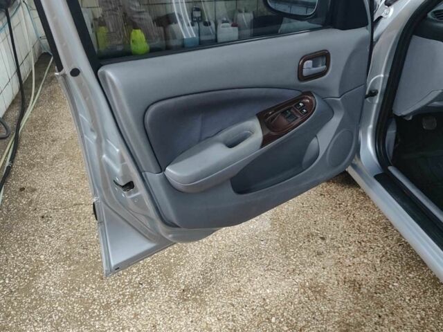 Серый Ниссан Альмера, объемом двигателя 1.5 л и пробегом 350 тыс. км за 2800 $, фото 15 на Automoto.ua