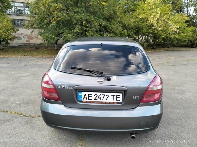 Серый Ниссан Альмера, объемом двигателя 1.5 л и пробегом 247 тыс. км за 3200 $, фото 3 на Automoto.ua