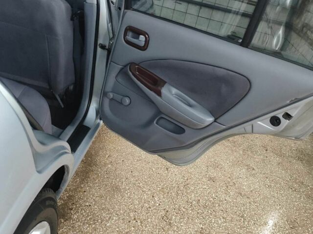 Серый Ниссан Альмера, объемом двигателя 1.5 л и пробегом 350 тыс. км за 2800 $, фото 8 на Automoto.ua