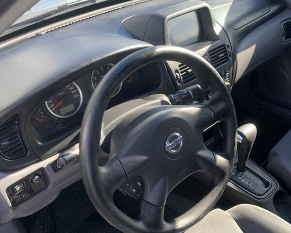 Серый Ниссан Альмера, объемом двигателя 1.77 л и пробегом 230 тыс. км за 4100 $, фото 2 на Automoto.ua