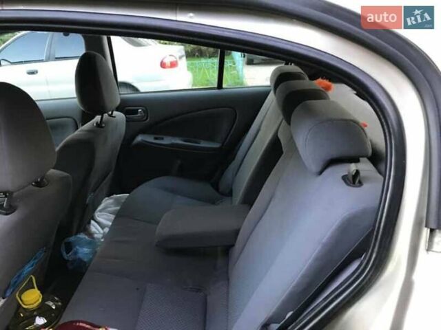 Сірий Ніссан Альмера, об'ємом двигуна 1.5 л та пробігом 292 тис. км за 3700 $, фото 6 на Automoto.ua