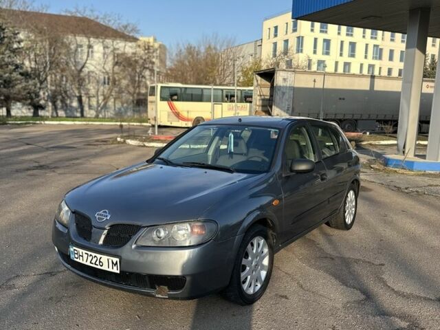 Серый Ниссан Альмера, объемом двигателя 1.5 л и пробегом 300 тыс. км за 2999 $, фото 6 на Automoto.ua