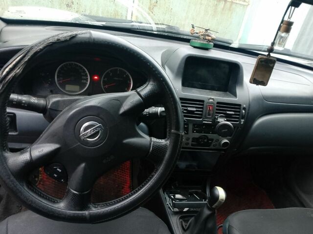 Сірий Ніссан Альмера, об'ємом двигуна 2 л та пробігом 400 тис. км за 1800 $, фото 1 на Automoto.ua