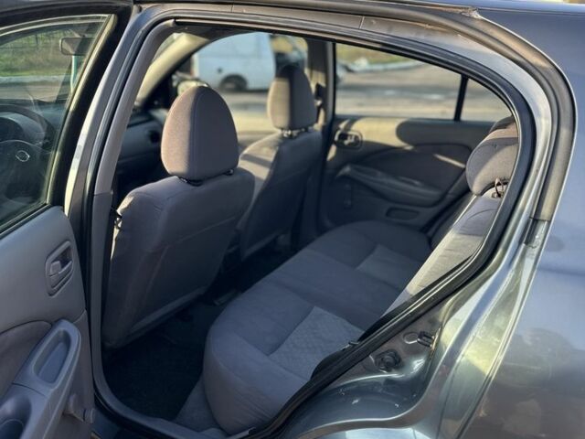 Серый Ниссан Альмера, объемом двигателя 1.5 л и пробегом 300 тыс. км за 2999 $, фото 14 на Automoto.ua