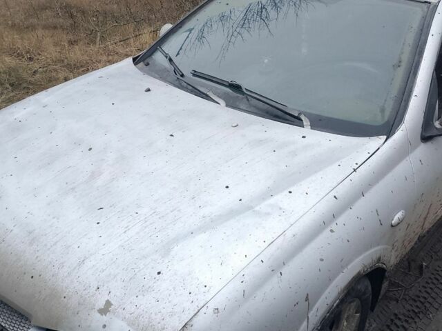 Сірий Ніссан Альмера, об'ємом двигуна 2 л та пробігом 400 тис. км за 1800 $, фото 6 на Automoto.ua