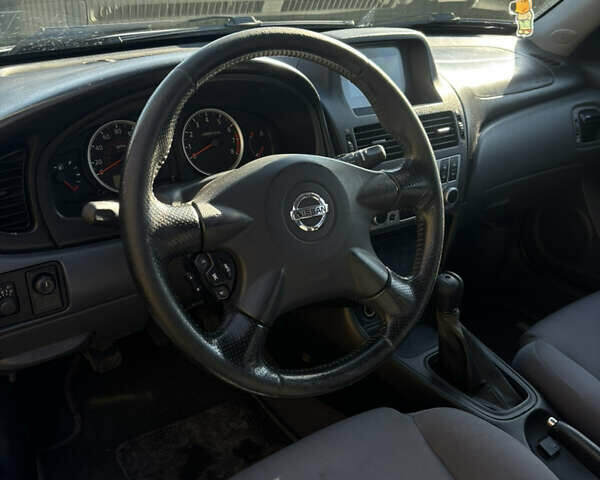 Сірий Ніссан Альмера, об'ємом двигуна 1.5 л та пробігом 155 тис. км за 3300 $, фото 6 на Automoto.ua