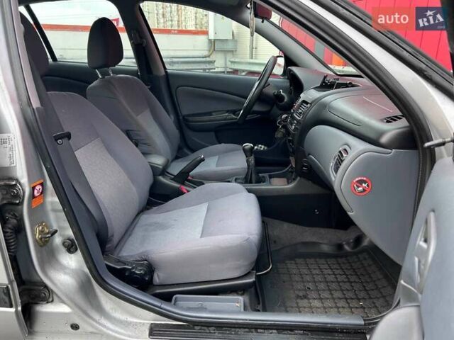 Сірий Ніссан Альмера, об'ємом двигуна 1.5 л та пробігом 204 тис. км за 4690 $, фото 11 на Automoto.ua