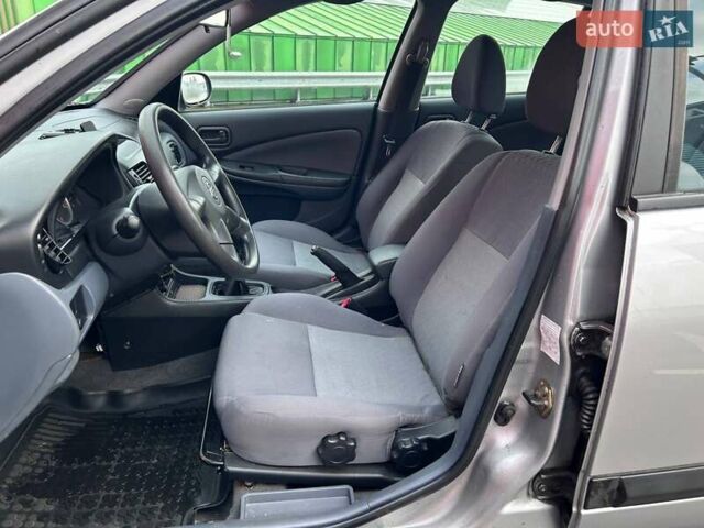 Сірий Ніссан Альмера, об'ємом двигуна 1.5 л та пробігом 204 тис. км за 4690 $, фото 8 на Automoto.ua