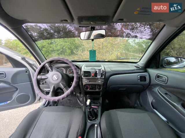 Серый Ниссан Альмера, объемом двигателя 1.5 л и пробегом 256 тыс. км за 4350 $, фото 9 на Automoto.ua