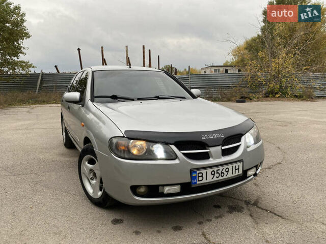 Серый Ниссан Альмера, объемом двигателя 1.5 л и пробегом 256 тыс. км за 4350 $, фото 3 на Automoto.ua