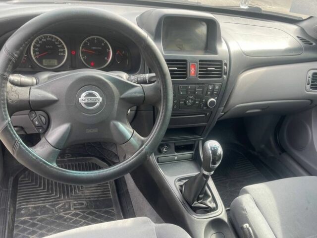 Серый Ниссан Альмера, объемом двигателя 1.5 л и пробегом 300 тыс. км за 3700 $, фото 5 на Automoto.ua