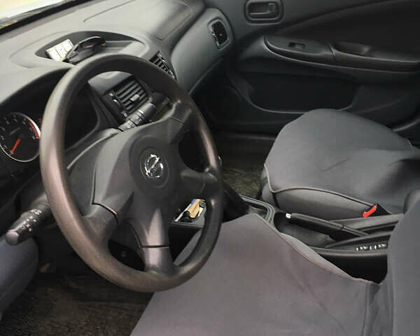 Серый Ниссан Альмера, объемом двигателя 1.5 л и пробегом 245 тыс. км за 3800 $, фото 3 на Automoto.ua