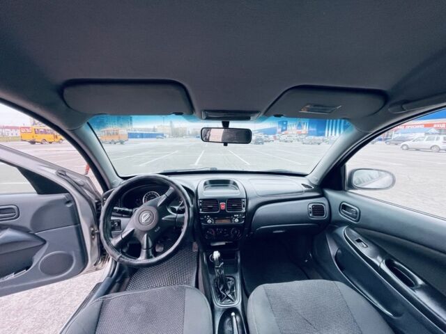 Сірий Ніссан Альмера, об'ємом двигуна 1.5 л та пробігом 3 тис. км за 2100 $, фото 5 на Automoto.ua