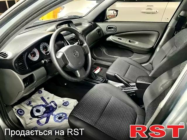 Серый Ниссан Альмера, объемом двигателя 1.6 л и пробегом 191 тыс. км за 5100 $, фото 5 на Automoto.ua
