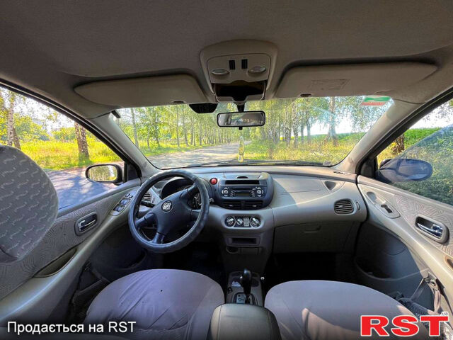 Серый Ниссан Альмера, объемом двигателя 2 л и пробегом 205 тыс. км за 3800 $, фото 7 на Automoto.ua