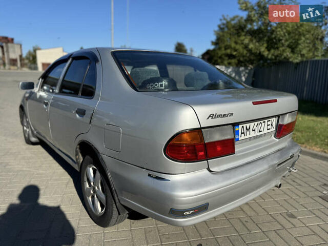 Серый Ниссан Альмера, объемом двигателя 1.6 л и пробегом 400 тыс. км за 1999 $, фото 7 на Automoto.ua