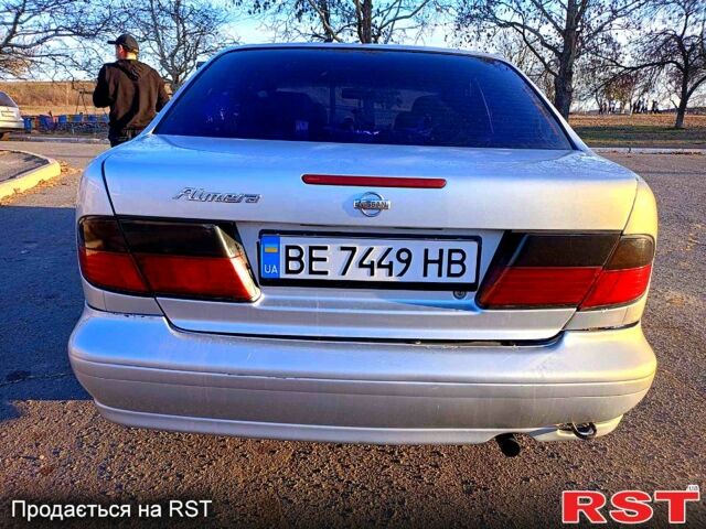 Серый Ниссан Альмера, объемом двигателя 1.6 л и пробегом 245 тыс. км за 1999 $, фото 8 на Automoto.ua