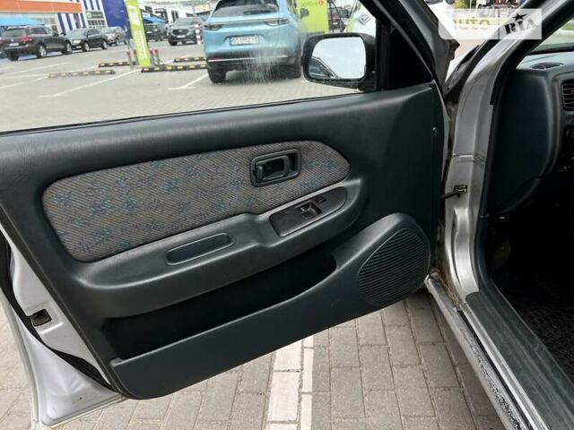 Сірий Ніссан Альмера, об'ємом двигуна 1.6 л та пробігом 393 тис. км за 1600 $, фото 20 на Automoto.ua