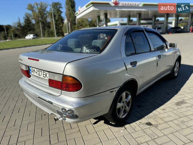 Серый Ниссан Альмера, объемом двигателя 1.6 л и пробегом 400 тыс. км за 1999 $, фото 5 на Automoto.ua