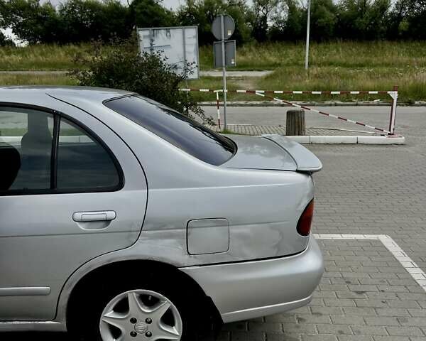 Сірий Ніссан Альмера, об'ємом двигуна 1.6 л та пробігом 393 тис. км за 1600 $, фото 9 на Automoto.ua