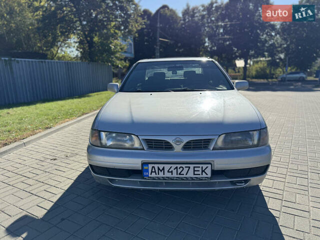 Серый Ниссан Альмера, объемом двигателя 1.6 л и пробегом 400 тыс. км за 1999 $, фото 2 на Automoto.ua