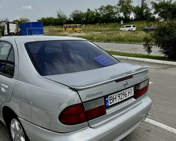 Сірий Ніссан Альмера, об'ємом двигуна 1.6 л та пробігом 393 тис. км за 1600 $, фото 10 на Automoto.ua