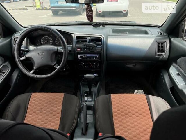 Сірий Ніссан Альмера, об'ємом двигуна 1.6 л та пробігом 393 тис. км за 1600 $, фото 11 на Automoto.ua