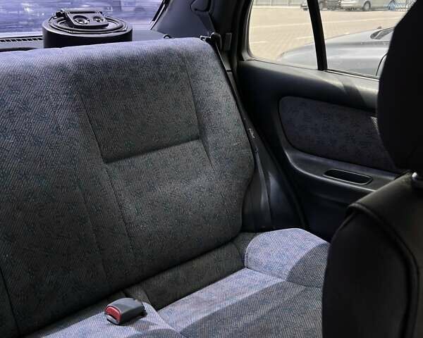 Сірий Ніссан Альмера, об'ємом двигуна 1.6 л та пробігом 393 тис. км за 1600 $, фото 19 на Automoto.ua
