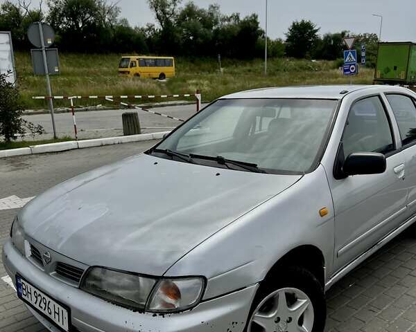 Сірий Ніссан Альмера, об'ємом двигуна 1.6 л та пробігом 393 тис. км за 1600 $, фото 7 на Automoto.ua