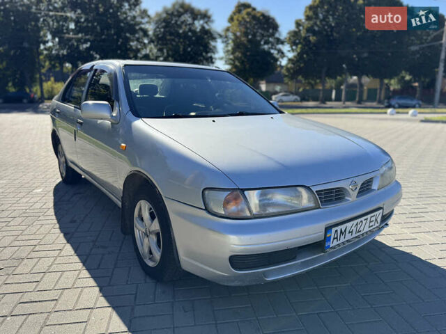 Серый Ниссан Альмера, объемом двигателя 1.6 л и пробегом 400 тыс. км за 1999 $, фото 3 на Automoto.ua