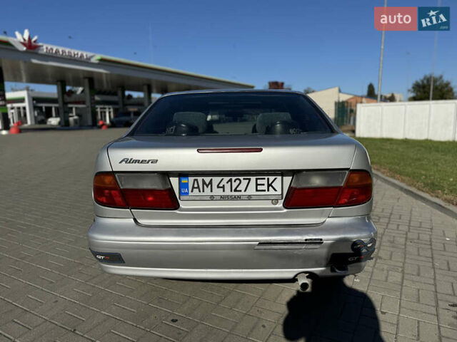 Серый Ниссан Альмера, объемом двигателя 1.6 л и пробегом 400 тыс. км за 1999 $, фото 6 на Automoto.ua