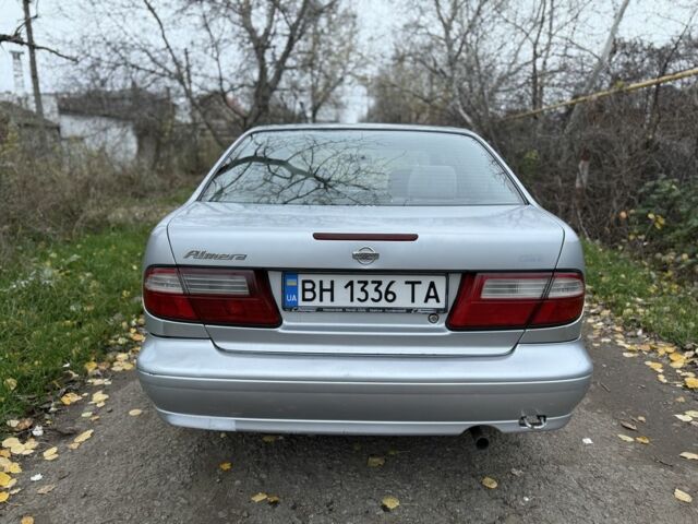 Серый Ниссан Альмера, объемом двигателя 1.6 л и пробегом 100 тыс. км за 1400 $, фото 5 на Automoto.ua