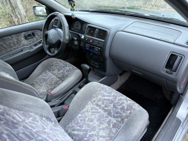 Серый Ниссан Альмера, объемом двигателя 1.6 л и пробегом 100 тыс. км за 1400 $, фото 7 на Automoto.ua