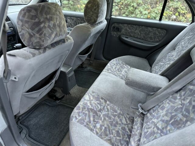 Серый Ниссан Альмера, объемом двигателя 1.6 л и пробегом 100 тыс. км за 1400 $, фото 8 на Automoto.ua