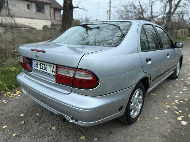 Серый Ниссан Альмера, объемом двигателя 1.6 л и пробегом 100 тыс. км за 1400 $, фото 3 на Automoto.ua