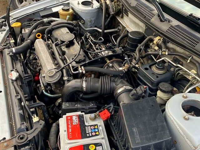 Серый Ниссан Альмера, объемом двигателя 2 л и пробегом 205 тыс. км за 2290 $, фото 7 на Automoto.ua